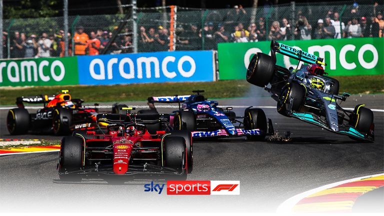 Ferrari's Carlos Sainz holds the lead in the first lap as Lewis Hamilton suffers a collision with Fernando Alonso and is out of the race at the Belgian Grand Prix