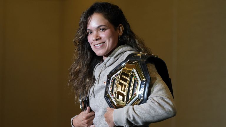 Amanda Nunes poses for a photographs during a news conference ahead of her fight against Irene Aldana at UFC 289, in Vancouver, British Columbia, Wednesday, June 7, 2023. (Darryl Dyck/The Canadian Press via AP)