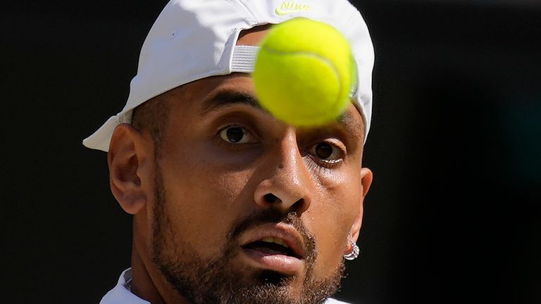 Australia&#39;s Nick Kyrgios returns to Serbia&#39;s Novak Djokovic in the final of the men&#39;s singles on day fourteen of the Wimbledon tennis championships in London, Sunday, July 10, 2022. (AP Photo/Kirsty Wigglesworth)