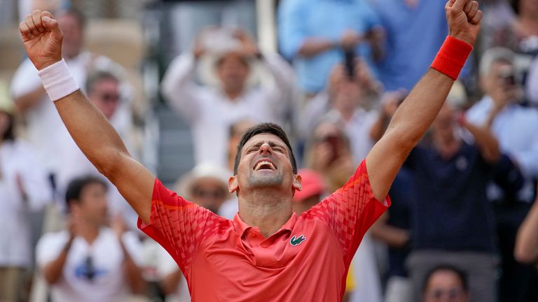 Serbia&#39;s Novak Djokovic celebrates winning the men&#39;s singles final match of the French Open tennis tournament against Norway&#39;s Casper Ruud in three sets, 7-6, (7-1), 6-3, 7-5, at the Roland Garros stadium in Paris, Sunday, June 11, 2023. Djokovic won his record 23rd Grand Slam singles title, breaking a tie with Rafael Nadal for the most by a man. (AP Photo/Christophe Ena)