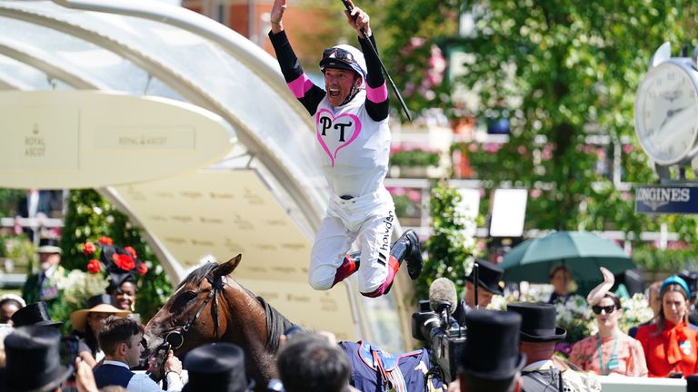 Frankie Dettori with a flying dismount after winning the Albany on Porta Fortuna